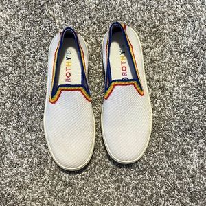 Rothy’s rainbow slip ons